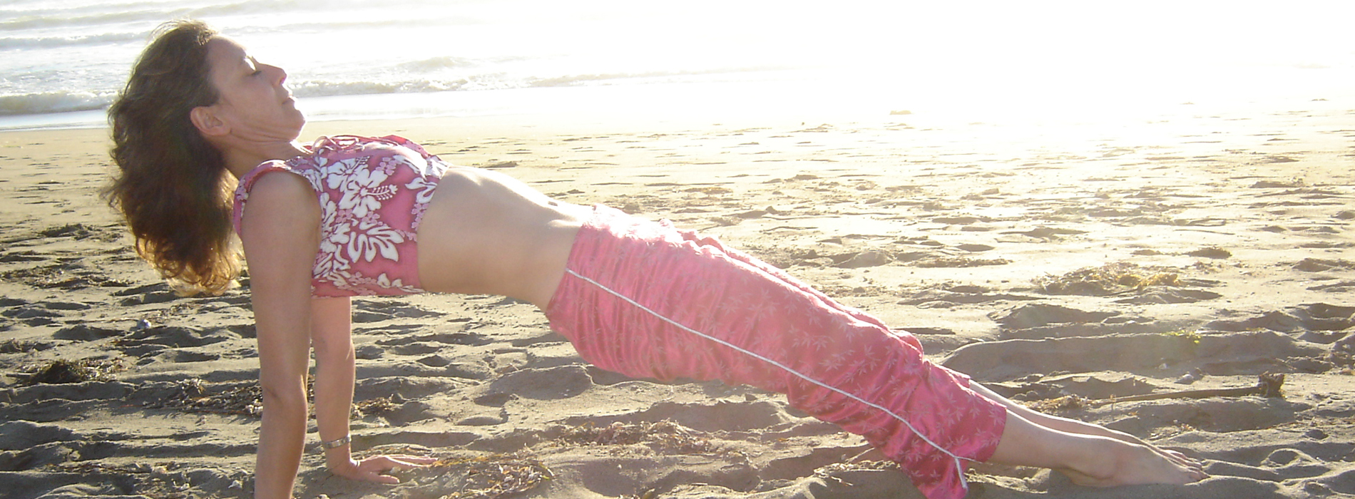 Sophie Phelps practicing yoga at Salmon Creek Beach, Bodega Bay